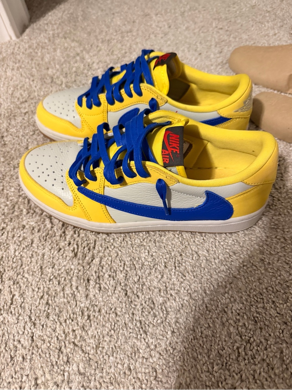 Nike × Travis Scott Air Jordan 1 Retro Low OG SP
"Canary" sneakers